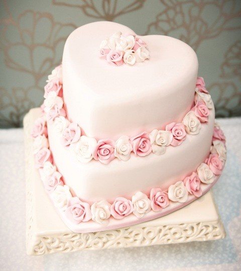 Pink wedding cake in the shape of hearts for lovers | Stock image |  Colourbox